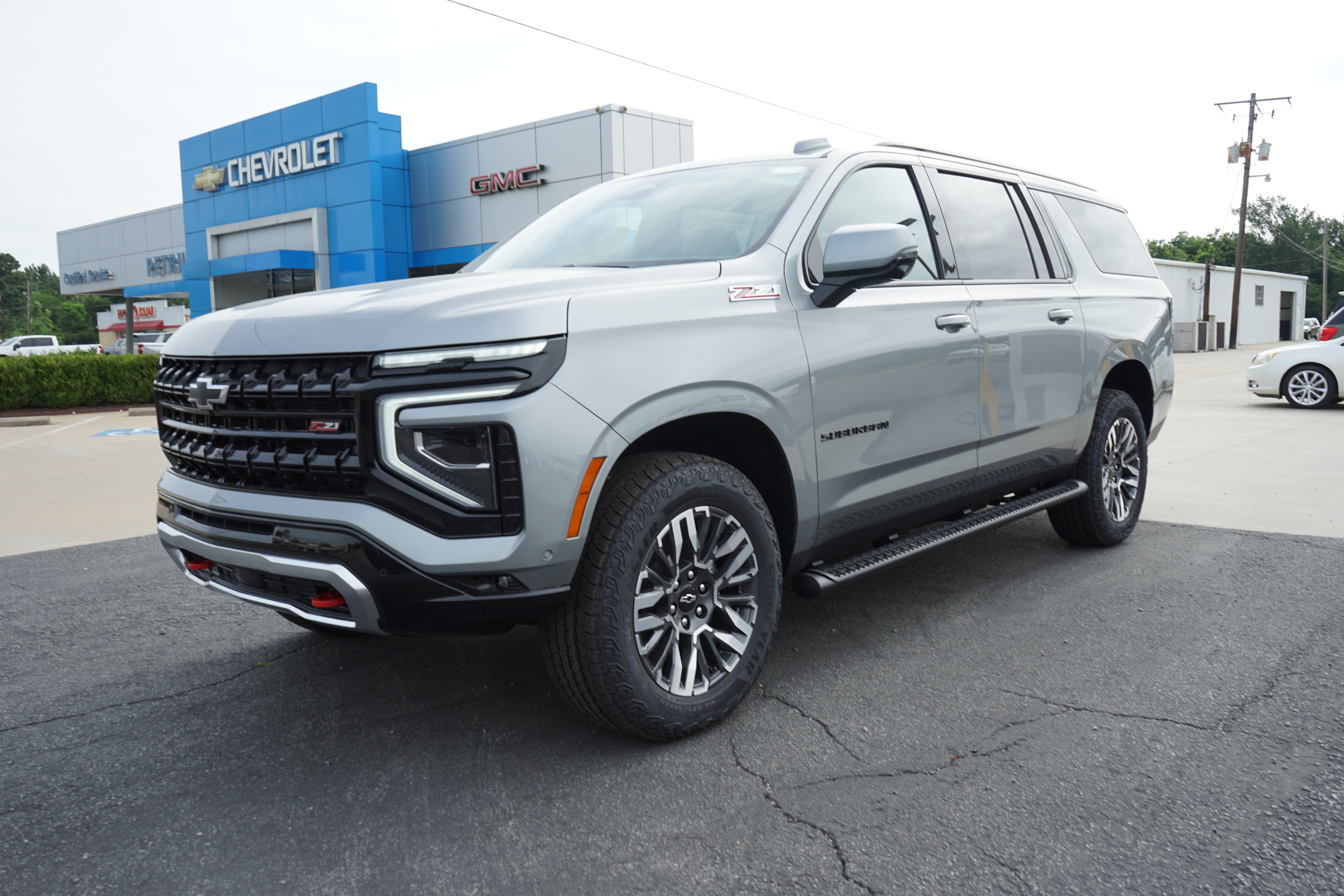 2026 Chevrolet Suburban Z71 in Sterling Gray Metallic — front three-quarter view