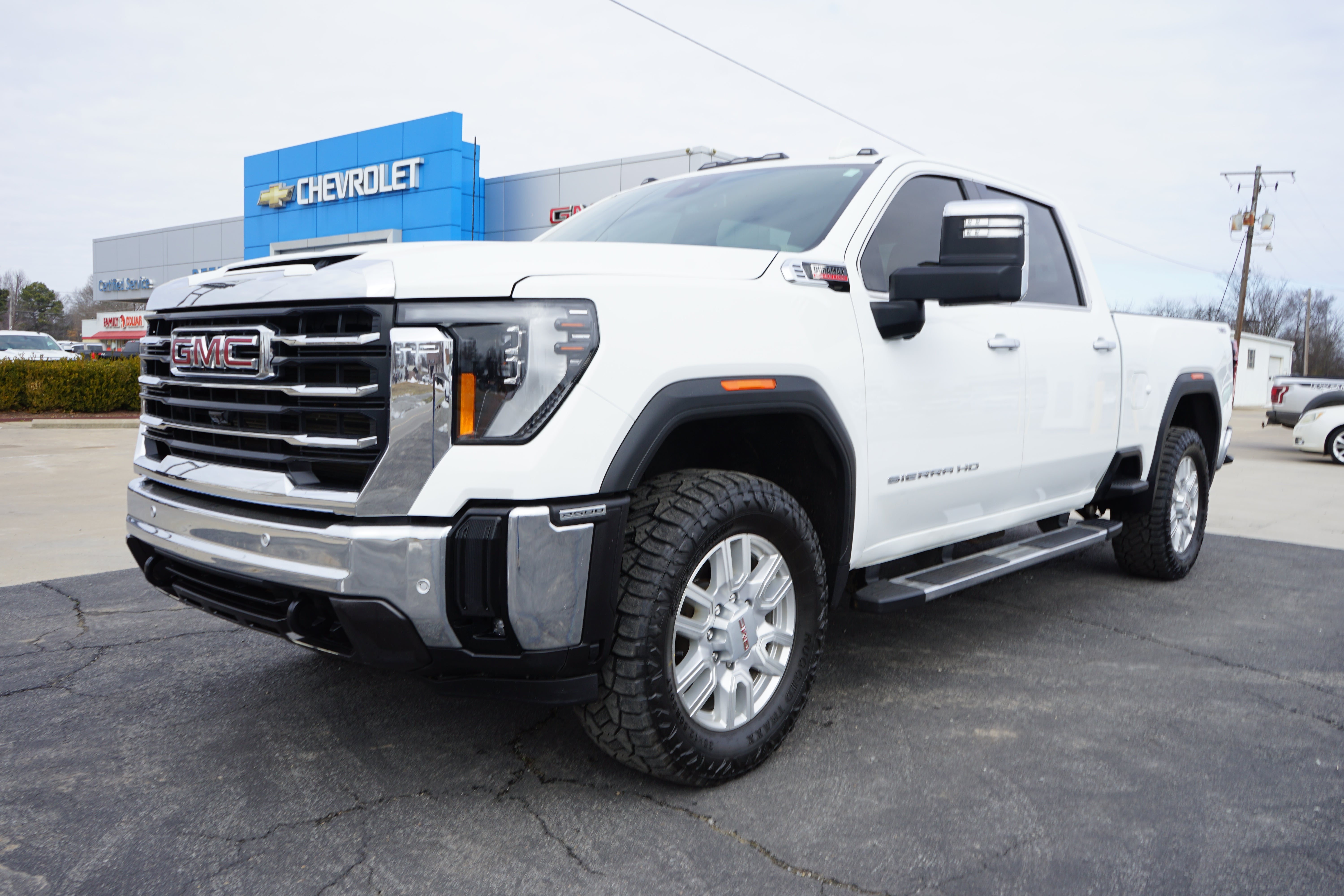 2024 GMC Sierra 2500 HD SLT in Summit White — front three-quarter view